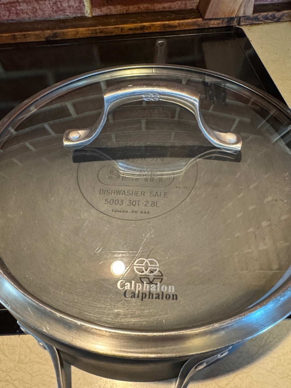 3 Quart Calphalon Gray Nonstick Sauté Pan with Glass Lid and Silver Handle - Picture 10 of 14
